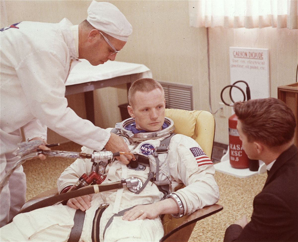 FILE - In this March 9, 1966 file photo, Astronaut Neil Armstrong is seated during a suiting up exercise Cape Kennedy, Florida, in preparation for the Gemini 8 flight.  (Associated Press)