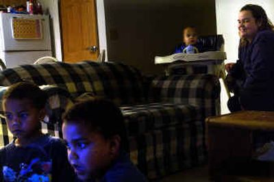 
Sonja Vernier, 31, voted on Tuesday for the first time. Vernier and her three children, from bottom right clockwise, Bakari Green, 6, Joaquim Green, 4, and Malik Standley, 18 months, were homeless until they recently moved into the Salvation Army housing.
 (Jed Conklin / The Spokesman-Review)