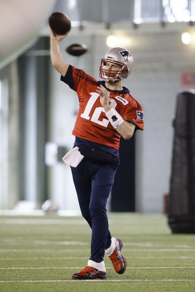 New England Patriots quarterback Tom Brady throws a pass during NFL football practice, Wednesday, Jan. 30, 2019, in Atlanta, as the team prepares for Super Bowl 53 against the Los Angeles Rams. (Matt Rourke / AP)