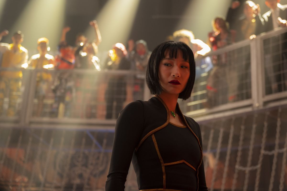 Simu Liu, above, and Meng’er Zhang, left, in “Shang-Chi and the Legend of the Ten Rings.”  (Jasin Boland/Marvel Studios)