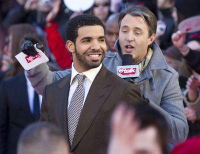 In this March 27, 2011 file photo, Drake arrives on the red carpet at the 2011 JUNO Awards, Canada's music awards in Toronto. The 31-year-old rapper on Friday, June 29, 2018, released Scorpion. In two songs on his fifth album, he addresses rumors that he fathered a son with a former French adult-film star. (Darren Calabrese / Canadian Press)
