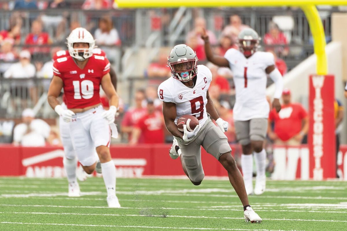 Washington State receiver Renard Bell (9) breaks into the open field after making a catch on a screen early in a nonconference game against Wisconsin on Sept. 10 at Camp Randall Stadium in Madison, Wisc.  (Kirsten Schmitt/For the Spokesman-Review)