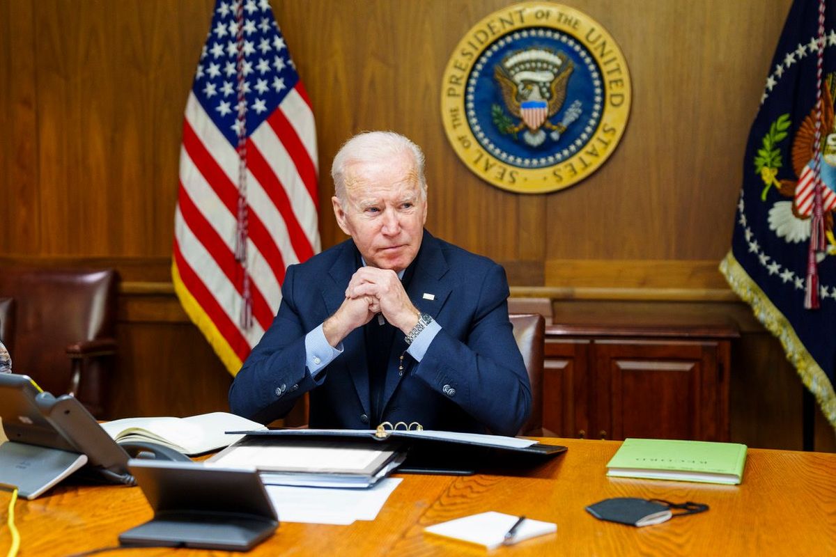 This image provided by The White House via Twitter shows President Joe Biden at Camp David, Md., Saturday, Feb. 12, 2022. Biden on Saturday again called on President Vladimir Putin to pull back more than 100,000 Russian troops massed near Ukraine’s borders and warned that the U.S. and its allies would “respond decisively and impose swift and severe costs” if Russia invades, according to the White House.  (HOGP)