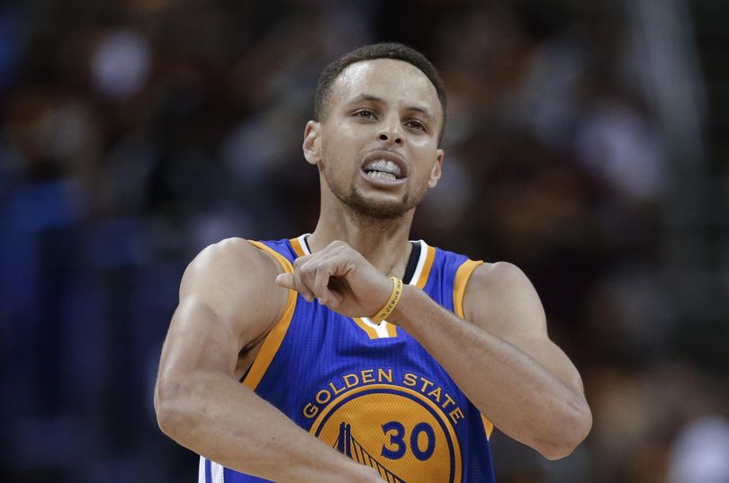 Golden State’s  Stephen Curry burned Cleveland with 38 points. (Tony Dejak / Associated Press)