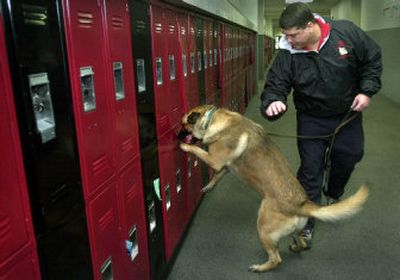 
Jager, a Belgian Malinois, and Robert Posey patrolled Sandpoint High together, searching for drugs in lockers, backpacks and cars.
 (File/ / The Spokesman-Review)