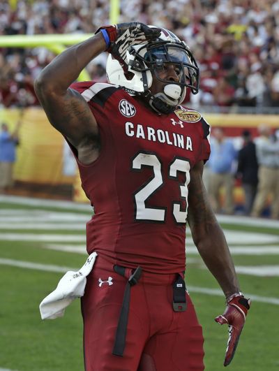 South Carolina wide receiver Bruce Ellington salutes after scoring on a 32-yard touchdown reception late in the fourth quarter. (Associated Press)