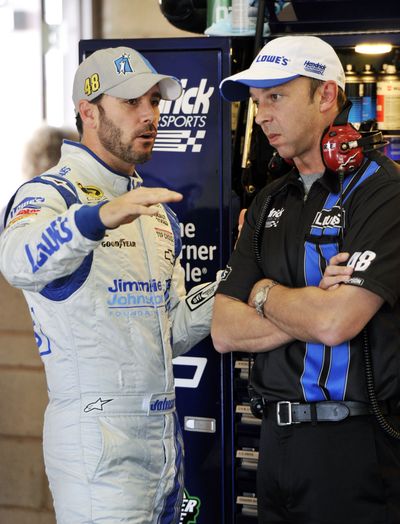 Jimmie Johnson, left, with crew chief Chad Knaus, hasn’t won in 11 races. (Associated Press)