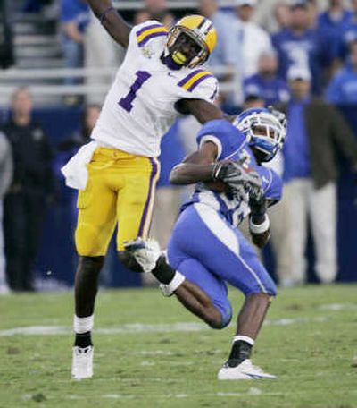 
Kentucky's Trevard Lindley, right, intercepts a pass intended for LSU's Brandon LaFell during the fourth quarter. Associated Press
 (Associated Press / The Spokesman-Review)