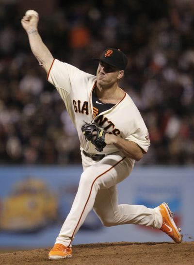 Giants closer Brian Wilson must forego wearing his orange cleats in the future. (Associated Press)