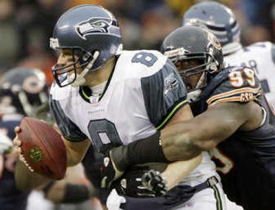 
If new starting fullback Leonard Weaver keeps doing his job, Seattle QB Matt Hasselbeck (8) can stay on his feet. Associated Press
 (Associated Press / The Spokesman-Review)