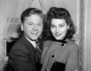 FILE - In this Jan. 5, 1942, file photo, Mickey Rooney, 21, Movieland's No. 1 box office star, and Ava Gardner, 19, of Wilson, N.C., pose together in Santa Barbara, Calif., shortly after the couple applied for a marriage license. Rooney, a Hollywood legend whose career spanned more than 80 years, has died. He was 93. Los Angeles Police Commander Andrew Smith said that Rooney was with his family when he died Sunday, April 6, 2014, at his North Hollywood home. (Associated Press)