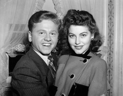 FILE - In this Jan. 5, 1942, file photo, Mickey Rooney, 21, Movieland's No. 1 box office star, and Ava Gardner, 19, of Wilson, N.C., pose together in Santa Barbara, Calif., shortly after the couple applied for a marriage license. Rooney, a Hollywood legend whose career spanned more than 80 years, has died. He was 93. Los Angeles Police Commander Andrew Smith said that Rooney was with his family when he died Sunday, April 6, 2014, at his North Hollywood home. (Associated Press)