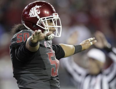 Washington State lineman Lyman Faoliu is part of a Cougars defense that is ranked in the top 10 nationally. (Associated Press)