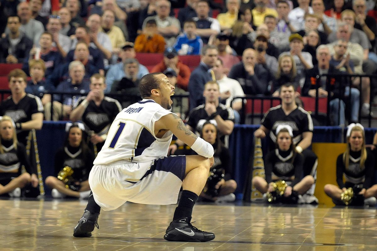 Venoy Overton of the University of Washington reacts after he took a charge and forced a turnover early in their game against Purdue. (Christopher Anderson / The Spokesman-Review)