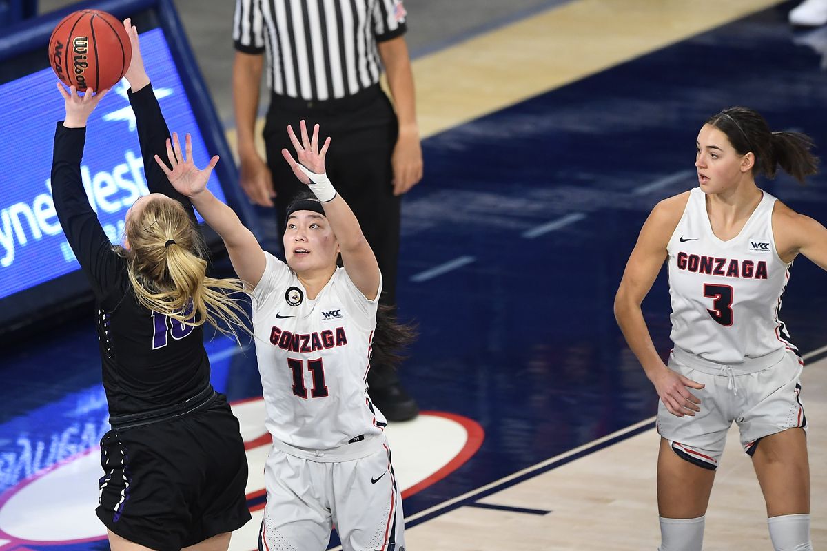 Gonzaga Bulldogs guard Kayleigh Truong (11) guards Portland Pilots guard Haylee Andrews (10) during the first half of a college basketball game on Saturday, January 9, 2021, at McCarthey Athletic Center in Spokane, Wash.  (Tyler Tjomsland/THE SPOKESMAN-RE)