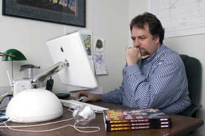 
Gareth-Michael Skarka works in his home office recently  in Lawrence, Kan. Skarka commissions, edits and sells e-books that generally never see print. Associated Press
 (Associated Press / The Spokesman-Review)