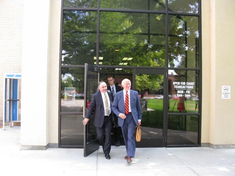 Attorneys Jason Risch and Timothy Hopkins leave the Twin Falls county courthouse on Tuesday after their clients won their case over the state Republican Party leadership. (Betsy Russell)