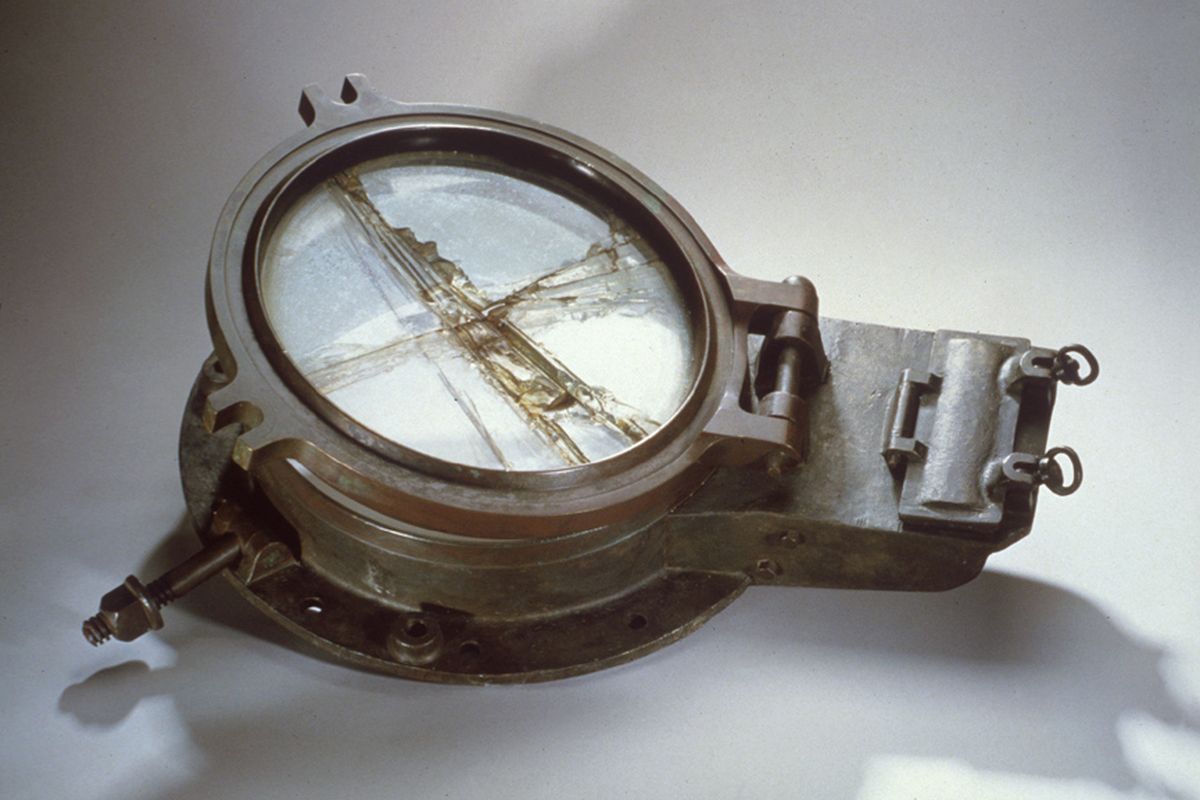 This Oct. 19, 2011, image provided by RMS Titanic, Inc. shows a porthole from the RMS Titanic which was recovered from the ocean floor during an expedition to the site of the tragedy.  The piece along with 5,000 other artifacts will be auctioned as a single collection on April 11, 100 years after the sinking of the ship. (AP/RMS  Titanic, Inc., a subsidiary of Premier Exhibitions, Inc.)