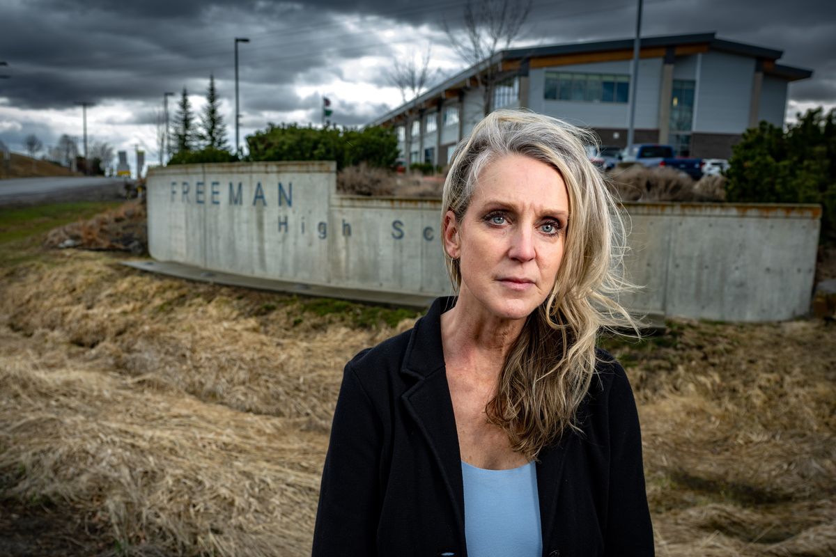 Anne-Marie Ophus was a teacher at Freeman High School during the shooting in 2017 and left teaching afterward. Ophus stands Thursday outside the school.  (COLIN MULVANY/THE SPOKESMAN-REVI)