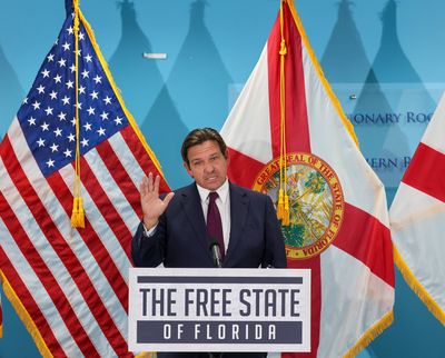 Gov. Ron DeSantis speaks at a news conference in Miami where he discussed his past COVID-era wins and current passed legislation on weather modification and fluoride at the Florida Department of Children & Families inside the Rhode Building in Miami on May 6.  (Carl Juste/Miami Herald)