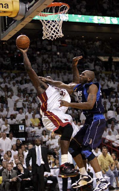 
Jerry Stackhouse's suspension came from this hard foul.  
 (Associated Press / The Spokesman-Review)