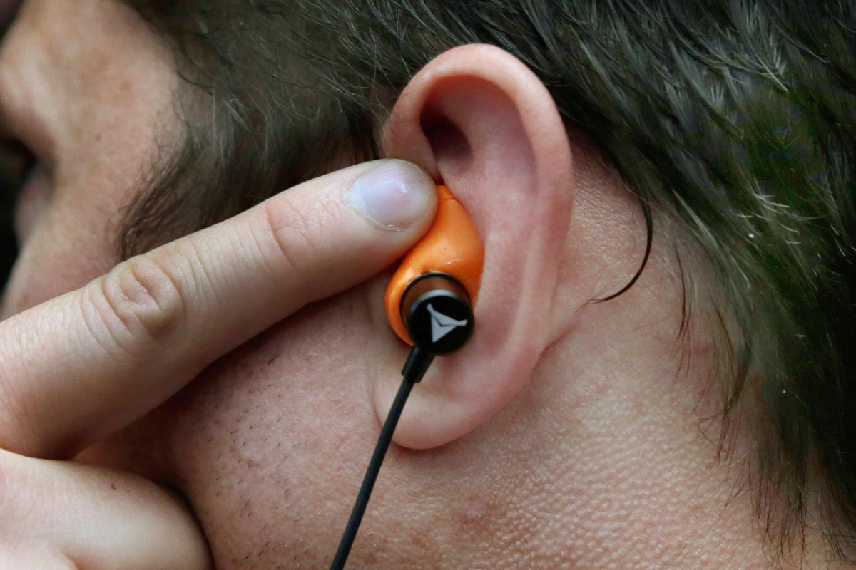 Kyle Kirkpatrick, CEO of Decibullz, demonstrates how his company’s earpieces are custom molded to the unique shape of the wearer’s ears, during a preview of products at CE Week in New York on Wednesday, June 22, 2016. Decibullz touts its earbuds as the first to be both custom and wireless. (Richard Drew / Associated Press)