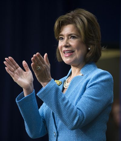 In this April 7, 2014 file photo, Maria Contreras-Sweet applauds during her ceremonial swearing in as Administrator of the Small Business Administration, in the South Court Auditorium on the White House complex in Washington. Two months into her tenure as SBA head, Contreras-Sweet wants the agency to find new ways of communicating with owners. She wants it to make loans easier and faster to get.  (Evan Vucci / Associated Press)