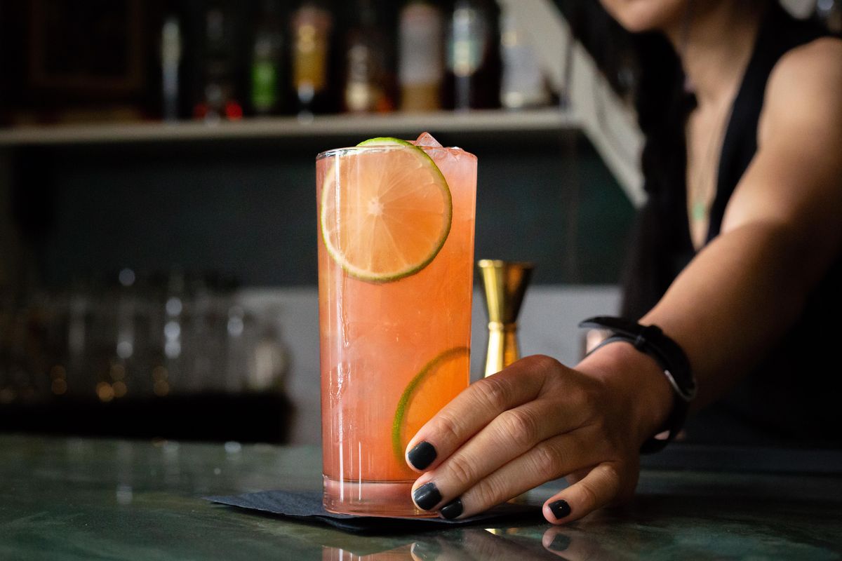 Bartender Diana Wissinger crafts a La Paloma Negre, containing tequila, grapefruit, Campari and lavender at RÜT Bar and Kitchen on Monday, April 15, 2019. The gastropub opened last Monday, April 8 in the South Hill District and is located at 901 W. 14th Avenue. (Libby Kamrowski / The Spokesman-Review)