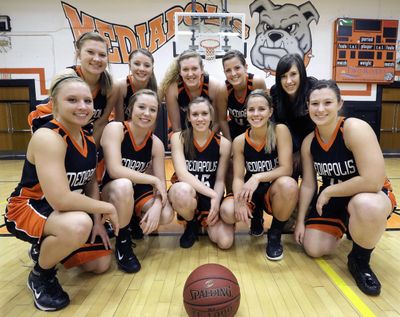 The Mediapolis (Iowa) High School girls basketball team includes 5 pair of sisters, including the team manager. (Associated Press)