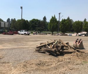 There wasn't much left of the Coeur d'Alene Skate Park when I took my noon walk along the waterfront Wednesday. Work crews are also smoothing out the overflow parking area north of the Coeur d'Alene Carousel for a future parking lot. (DFO/Huckleberries photo)