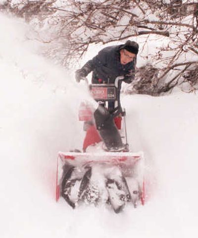 
There's really no way to look good blowing snow.
 (FILE / The Spokesman-Review)