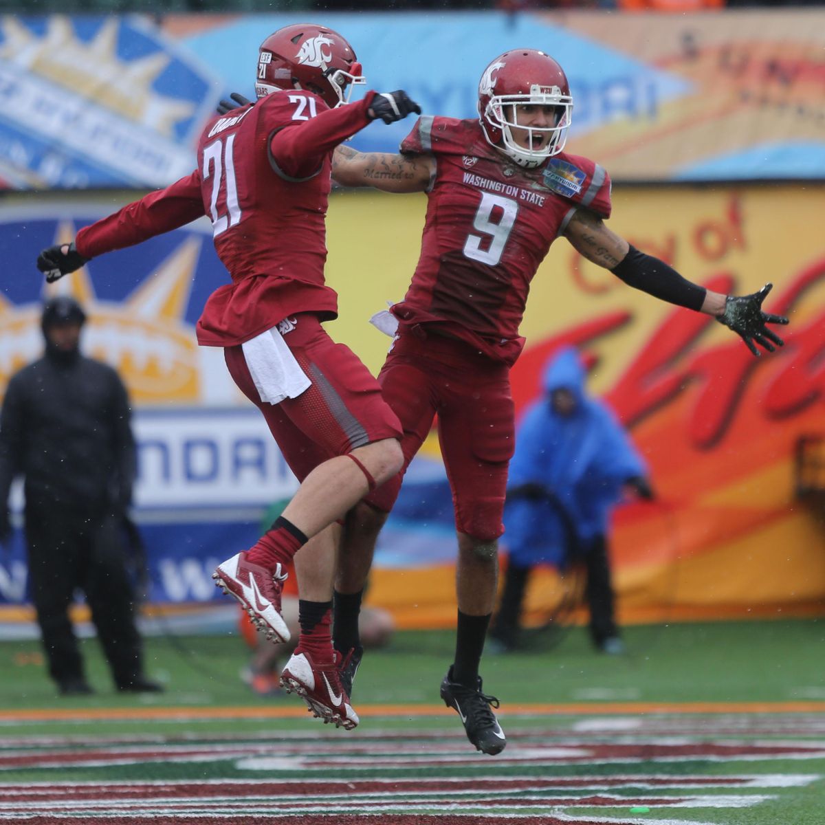 Washington State receiver Gabe Marks, right, celebrates with teammate River Cracraft after scoring a touchdown during the first half of the Sun Bowl NCAA college football game against Miami, Saturday Dec. 26, 2015 in El Paso, Texas. (Victor Calzada / AP)