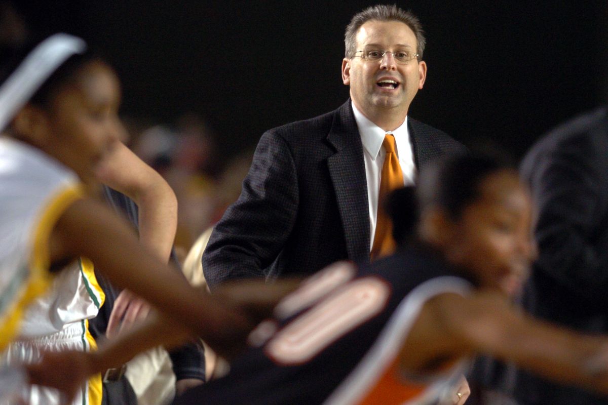 Extracurricular position: Lewis and Clark girls basketball coach Jim Redmon instructs his team at the 2008 State 4A tournament. (File photos)