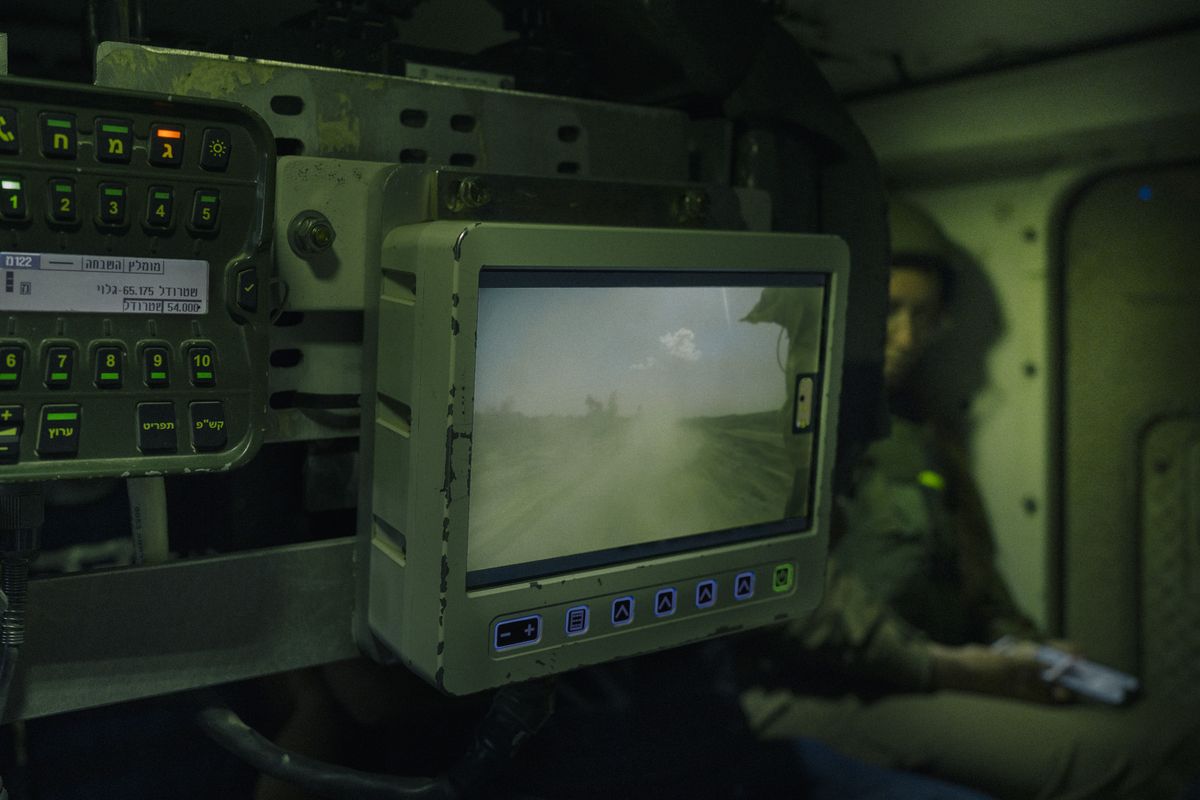 A screen mounted inside an IDF armored vehicle on Sunday shows the main road that bisects the Gaza Strip during an embed with Israeli forces.    (Lorenzo Tugnoli for The Washington Post)