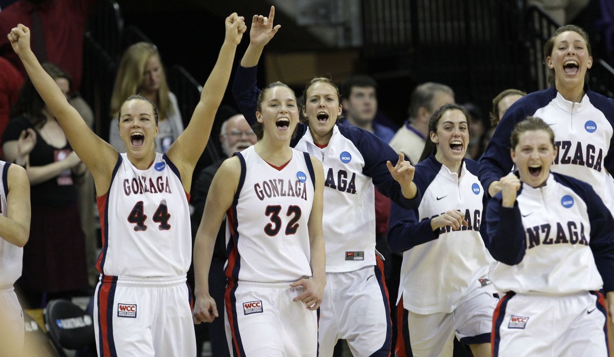 Gonzaga players rush from the bench as the final buzzer sounds against North Carolina during an NCAA first-round college basketball game Saturday, March 20, 2010, in Seattle. Gonzaga won 82-76. (Elaine Thompson / Associated Press)