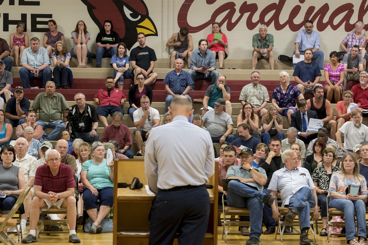 During a public meeting, Fairchild Air Force Base Commander, Col. Ryan Samuelson addresses concerns about the chemical contaminants  that have entered drinking water wells in and around the city of Airway Heights, Tuesday, May 23, 2017. (Colin Mulvany / The Spokesman-Review)