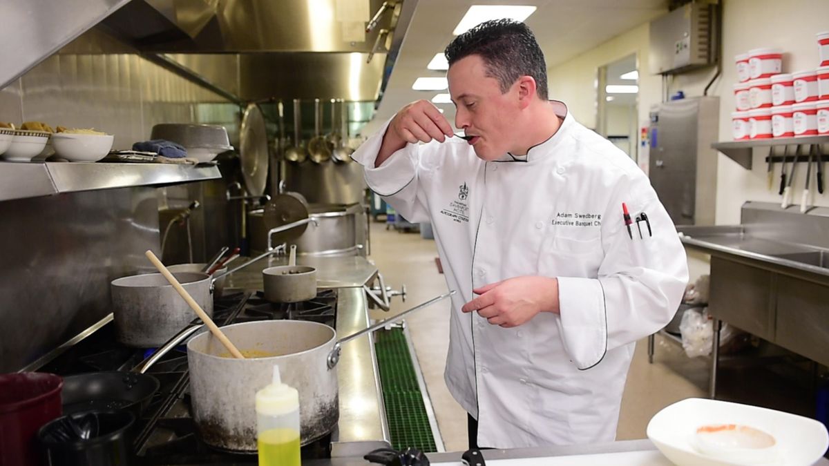 While finishing his tomato sauce, Chef Adam Swedberg of the Davenport Hotel tastes it to make sure the flavors have melded properly while demonstrating the five mother sauces of French cooking May 19, 2017. (Jesse Tinsley / The Spokesman-Review)