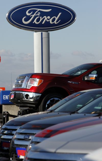 A number of 2010 Ford vehicles sit at a Ford dealership in Denver. In 2009, Ford gained U.S. market share for the first time since 1995.  (File Associated Press)