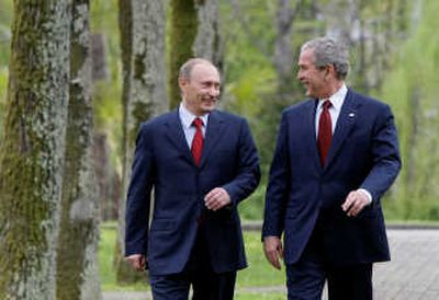 
President Bush and Russian President Vladimir Putin walk to a joint press conference Sunday in  Sochi, Russia. Associated Press
 (Associated Press / The Spokesman-Review)