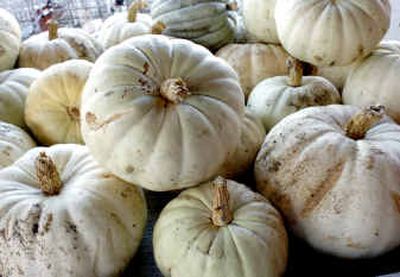 
White pumpkins are shown on display at Peck's Farm Markets near Spring Green, Wis., last week. 
 (Associated Press / The Spokesman-Review)