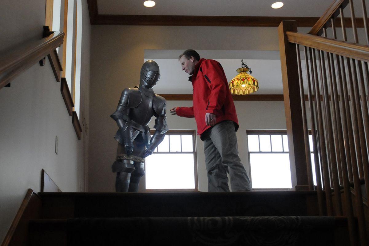 "Shlep, The Protector," greets Arbor Crest general manager, Jim van Loben Sels, at the top of the upper residence level of the rebuilt landmark Cliff House. "Shlep" survived the devastating fire and was restored. (J. Rayniak / The Spokesman-Review)