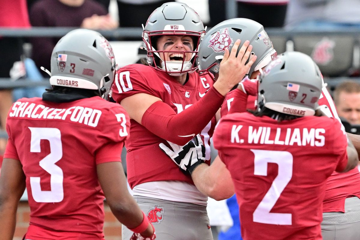 Washington State Cougars quarterback John Mateer (10) celebrates scoring a touchdown against the Hawaii Warriors during the second half of a college football game on Saturday, Oct. 19, 2024, at Gesa Field in Pullman, Wash. WSU won the game 42-10.  (Tyler Tjomsland/The Spokesman-Review)