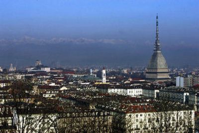 
A view of Turin, in northwest Italy, is seen. At right, the Mole Antonelliana Dome houses a 276-foot elevator that offers a spectacular view. In the background are the Italian Alps.
 (Associated Press / The Spokesman-Review)
