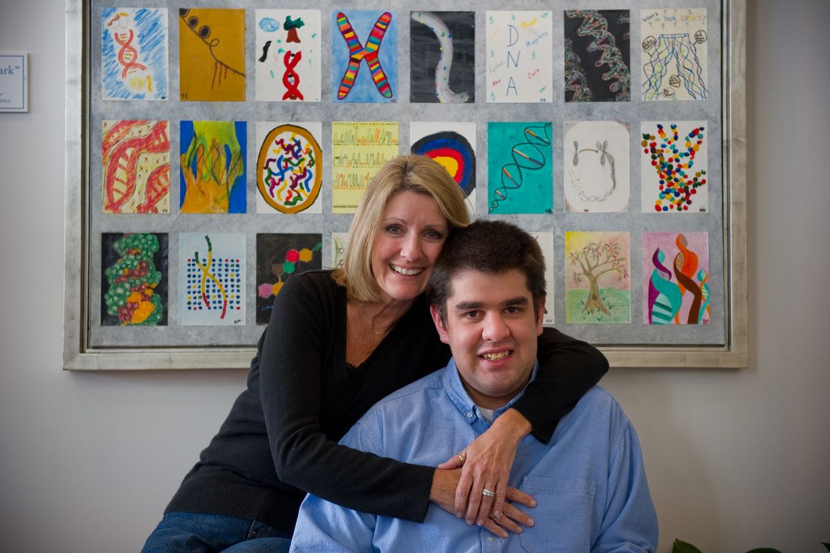Shawn Helbig with his mother, Sandy Britt, are seen during a visit to Emory University’s Department of Human Genetics in Atlanta.  (Associated Press)