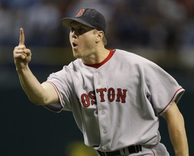 Red Sox relief pitcher Jonathan Papelbon signals after Boston defeated Tampa Bay 4-2 in Game 6. (Associated Press / The Spokesman-Review)