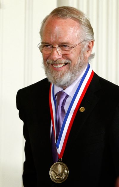 John E. Warnock, co-founder of Adobe Systems Inc., smiles after he was presented with a 2008 National Medal of Technology and Innovation during an East Room ceremony Oct. 7, 2009, at the White House in Washington, D.C.    (Alex Wong/Getty Images North America/TNS)
