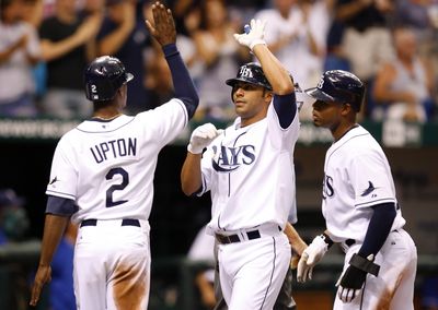 B.J. Upton, Carlos Pena and Carl Crawford, left to right, have given the upstart Tampa Bay Rays a shot at the A.L. East title.  (Associated Press / The Spokesman-Review)