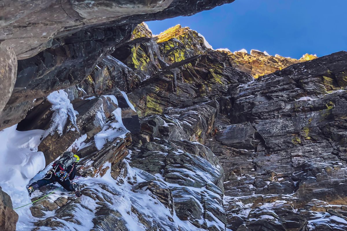 Jess Roskelley leads a pitch of a newly established route in the Cabinet Mountains, the Canmore Wedding Party (AI5 M7, 2,625 feet). (Scott Coldiron / Courtesy)