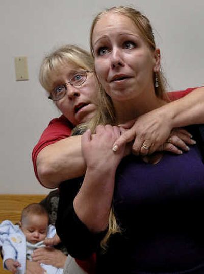 
Kendra Goodrick gets a hug from her aunt, Marcie Black, in the Kootenai County Justice Building last month.  Goodrick, who was later ordered to serve the rest of her prison sentence, was released Friday. 
 (File / The Spokesman-Review)