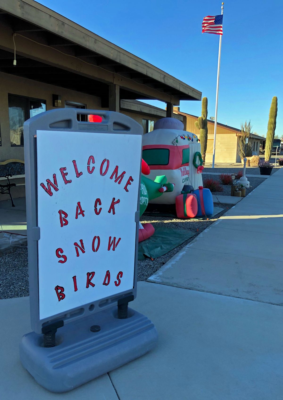 A sign at an RV park in Quartzsite welcomes back its community. (Leslie Kelly)